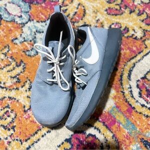 Nike Blue Sneakers with White Swoosh